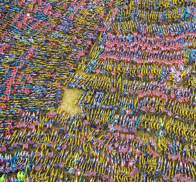 Как выглядит «кладбище» велосипедов в Китае 3