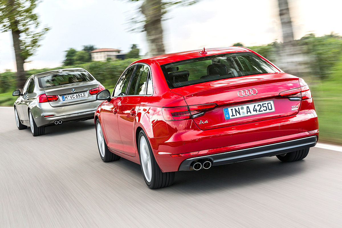 Сравнительный тест-драйв Audi A4 и BMW 3й серии 11