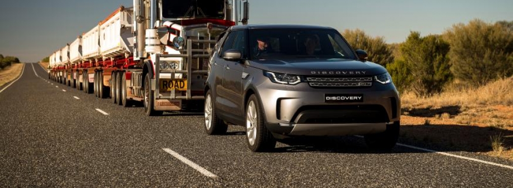 Land Rover Discovery взял на буксир 110-тонный автопоезд