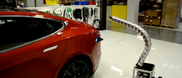 Компания Tesla показала свой прототип автоматического зарядного устройства